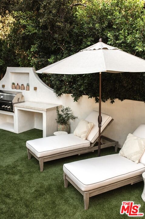 1436 Ethel Street Glendale, CA 91207 - Photo 43 of 47 a view of a patio with a table and chairs