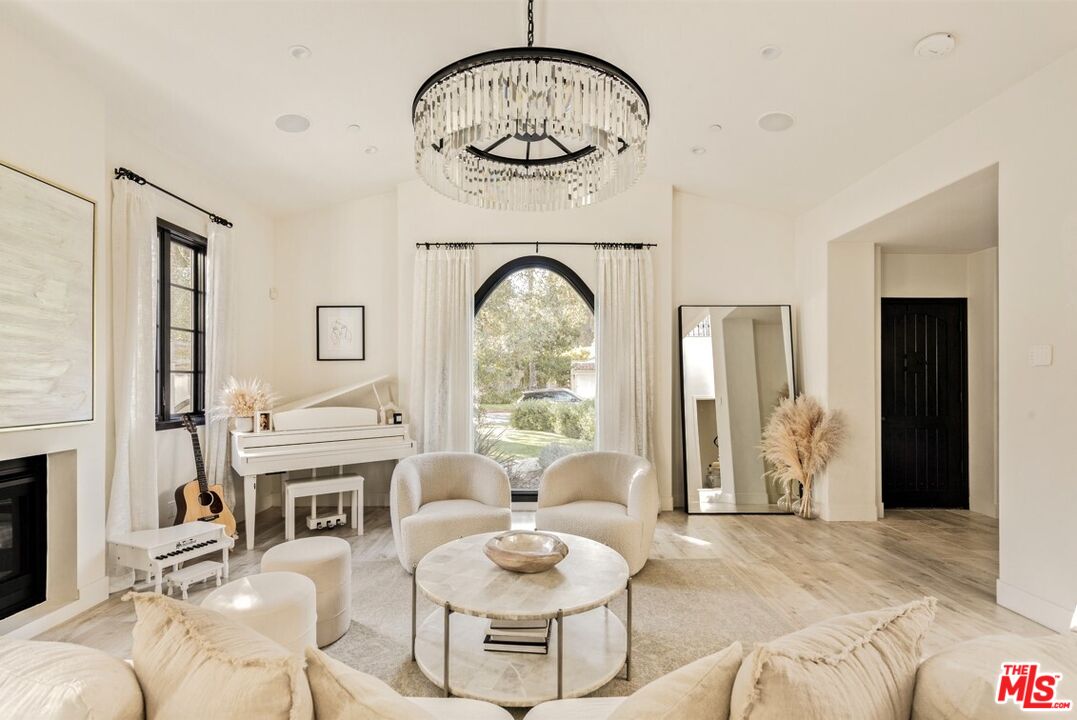 1436 Ethel Street Glendale, CA 91207 - Photo 6 of 47 a living room with furniture a fireplace and decor