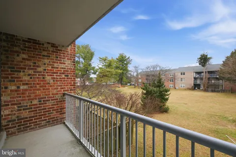a view of balcony with furniture