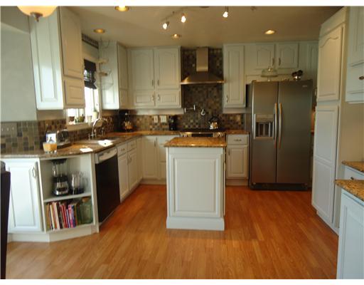456 Holyoke Road Butler, PA 16001 - Photo 2 of 18 Exterior Front. Gorgeous kitchen with granite counter tops, slate back splash, convection oven, under cabinet lighting, and kitchen island.
