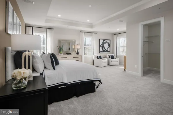 a bed room with bed and window