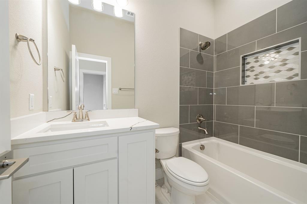 424 Deer Lane Celeste, TX 75423 - Photo 34 of 40 a bathroom with a sink a toilet and shower