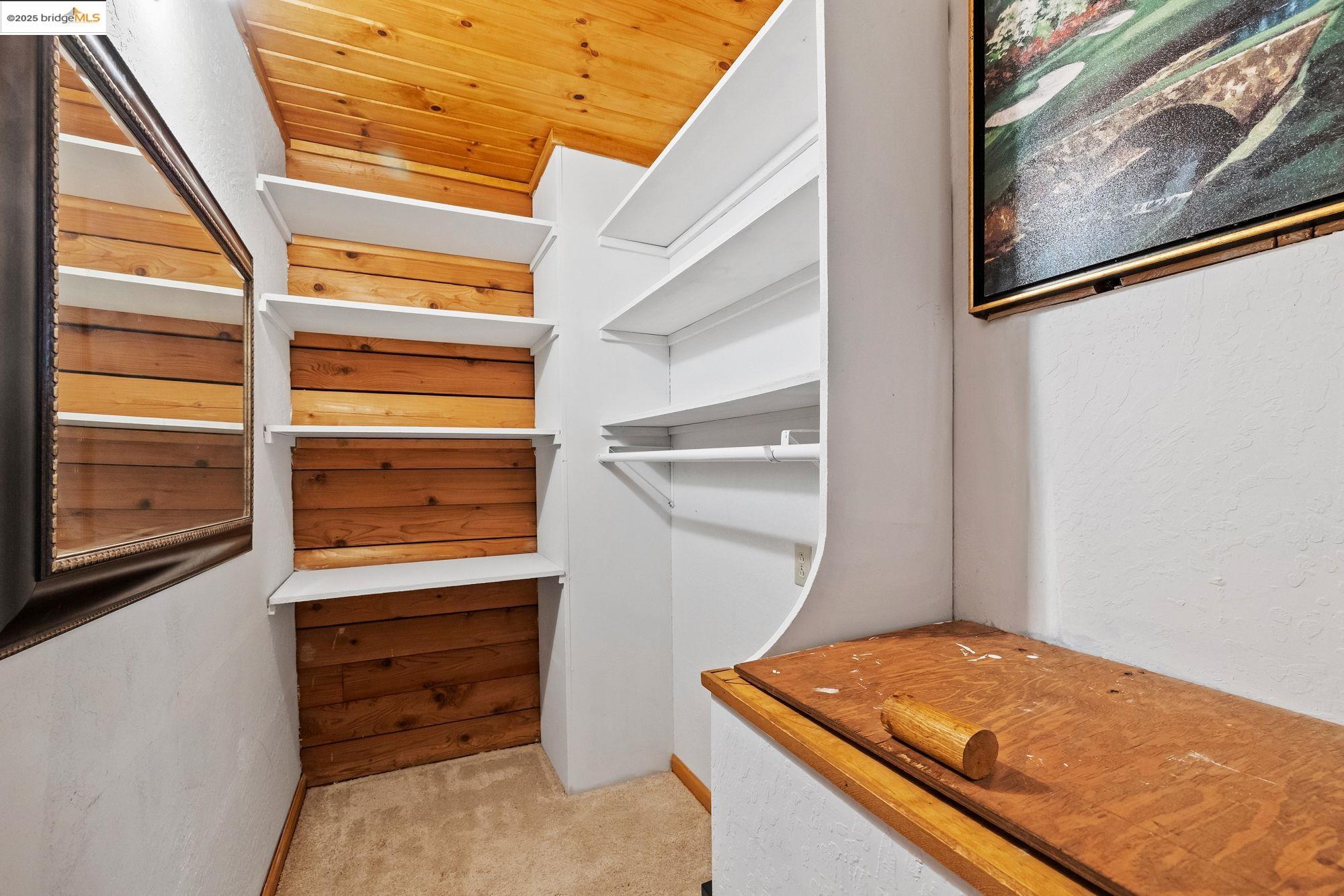 14799 Big Hill Road Sonora, CA 95370 - Photo 32 of 60 Walk in closet featuring light colored carpet