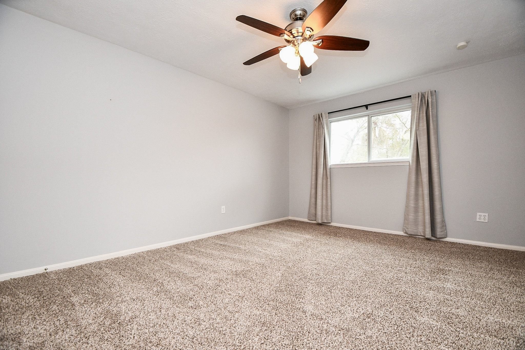 14011 Wickersham Lane Houston, TX 77077 - Photo 32 of 38 One of three spacious, secondary bedrooms.