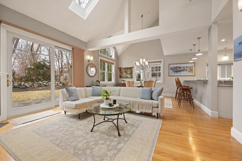 23 Courtyard Place, Unit 23 Lexington, MA 02420 - Photo 3 of 28 a living room with furniture and a large window