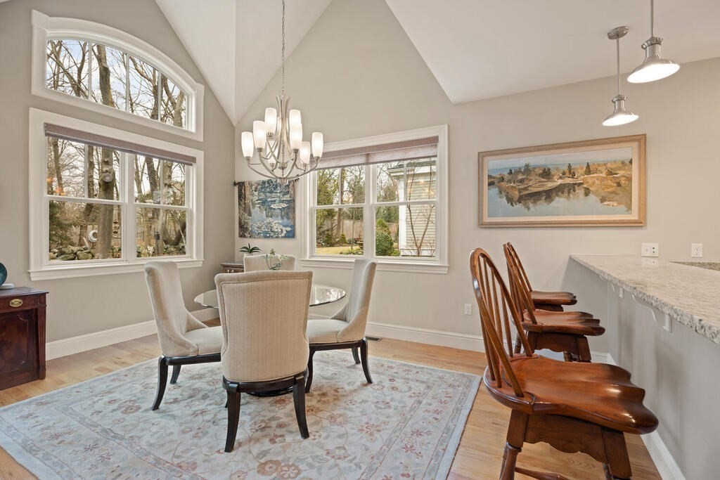 23 Courtyard Place, Unit 23 Lexington, MA 02420 - Photo 6 of 28 a view of a dining room with furniture window and outside view