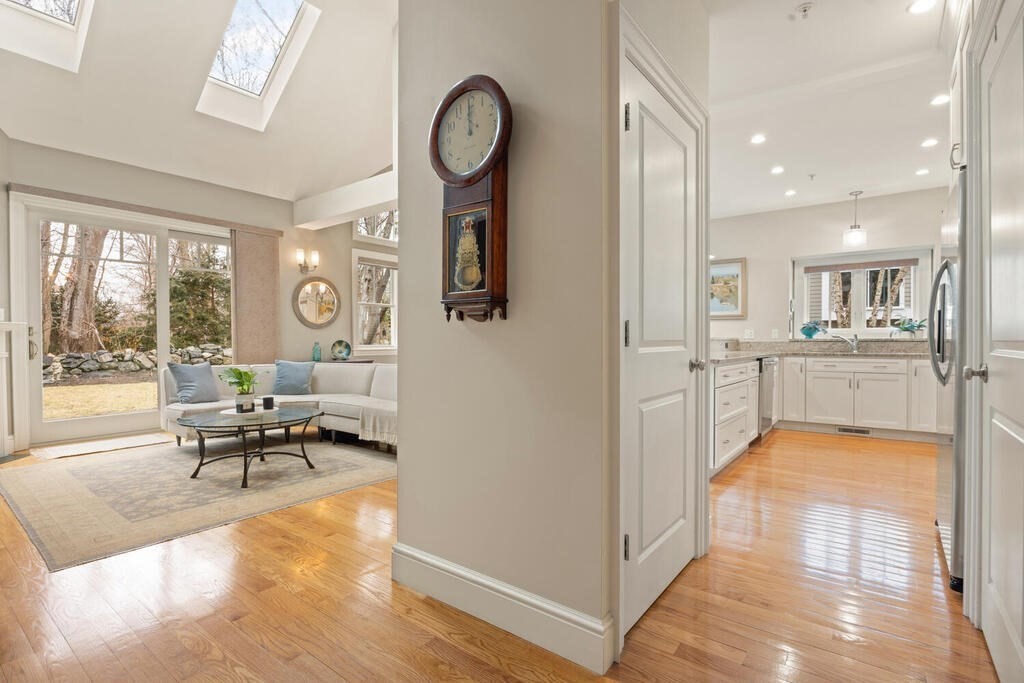 23 Courtyard Place, Unit 23 Lexington, MA 02420 - Photo 8 of 28 a living room with furniture and a large window