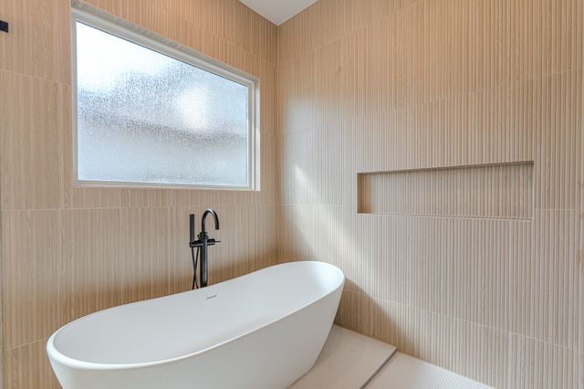 a large kitchen with a lot of counter space and a sink