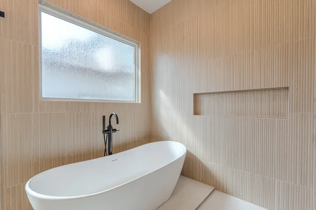 a large kitchen with a lot of counter space and a sink