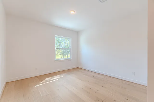 a view of a room with a large window