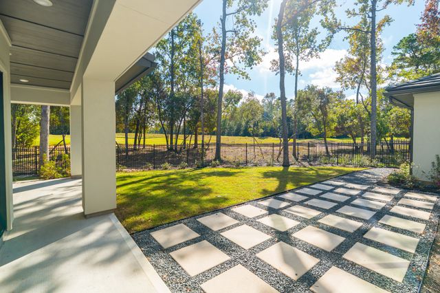 a bathroom with a sink vanity and tub