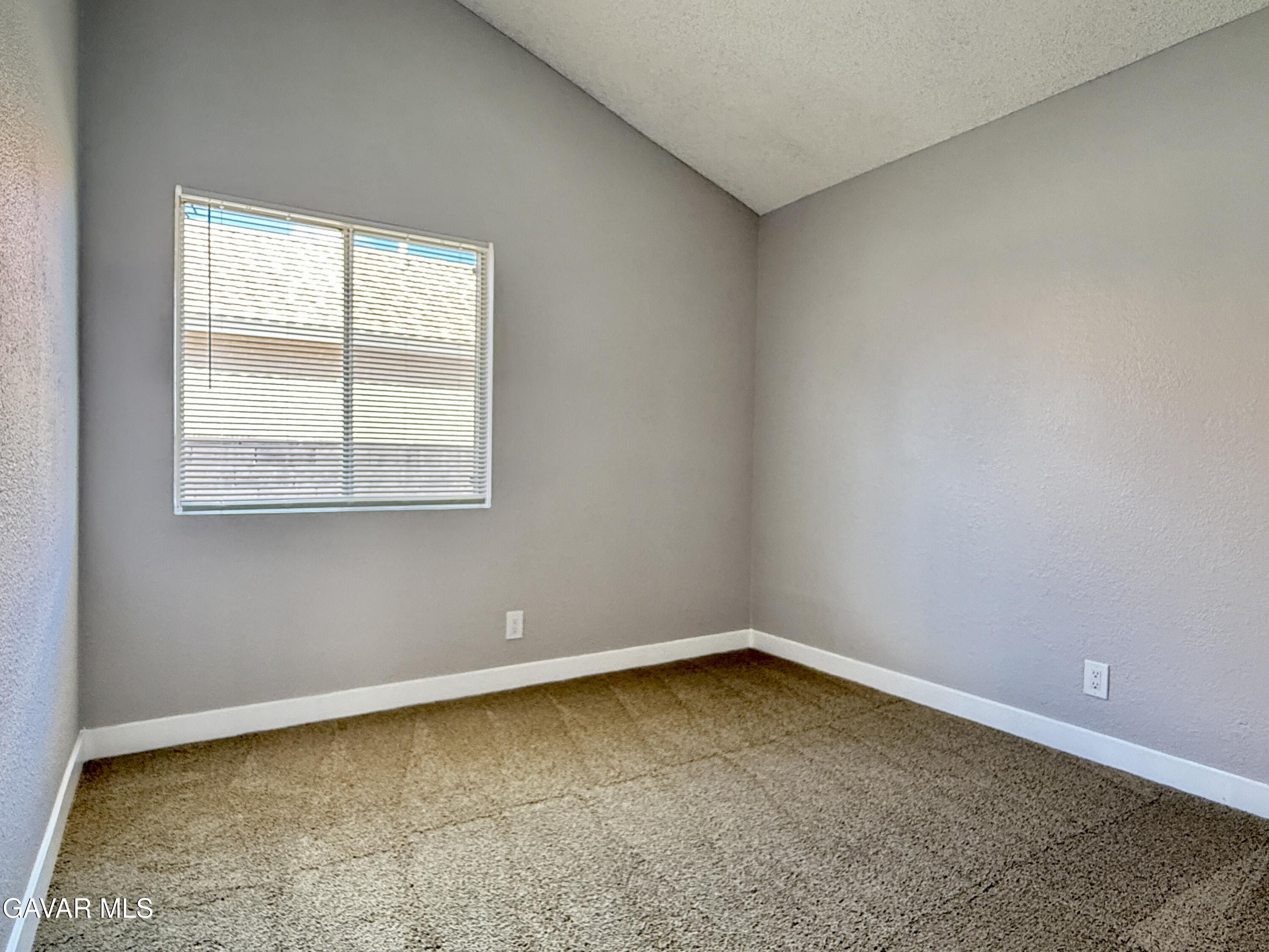 36931 Charter Court Palmdale, CA 93552 - Photo 11 of 20 an empty room with a window