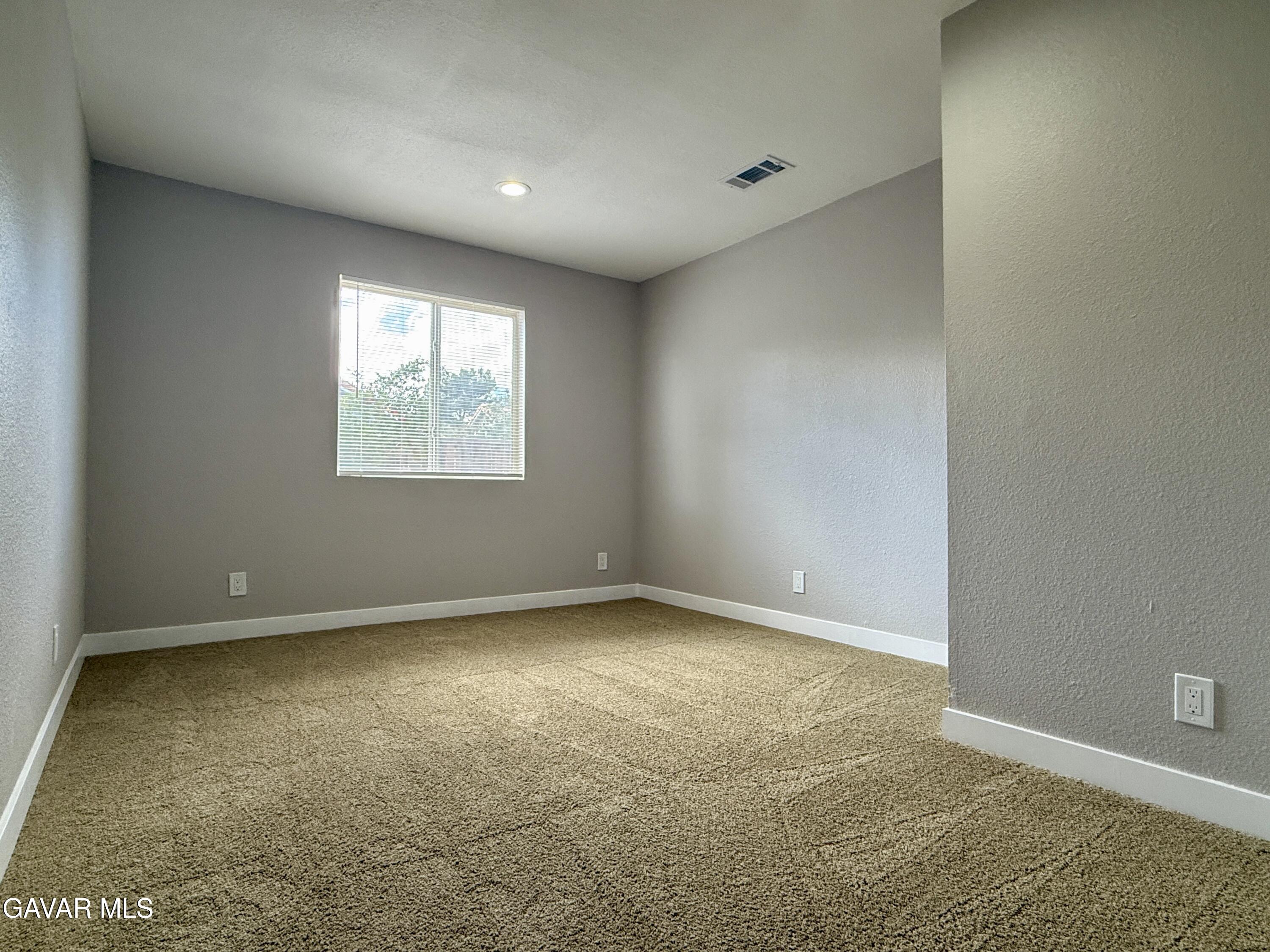 36931 Charter Court Palmdale, CA 93552 - Photo 13 of 20 an empty room with windows