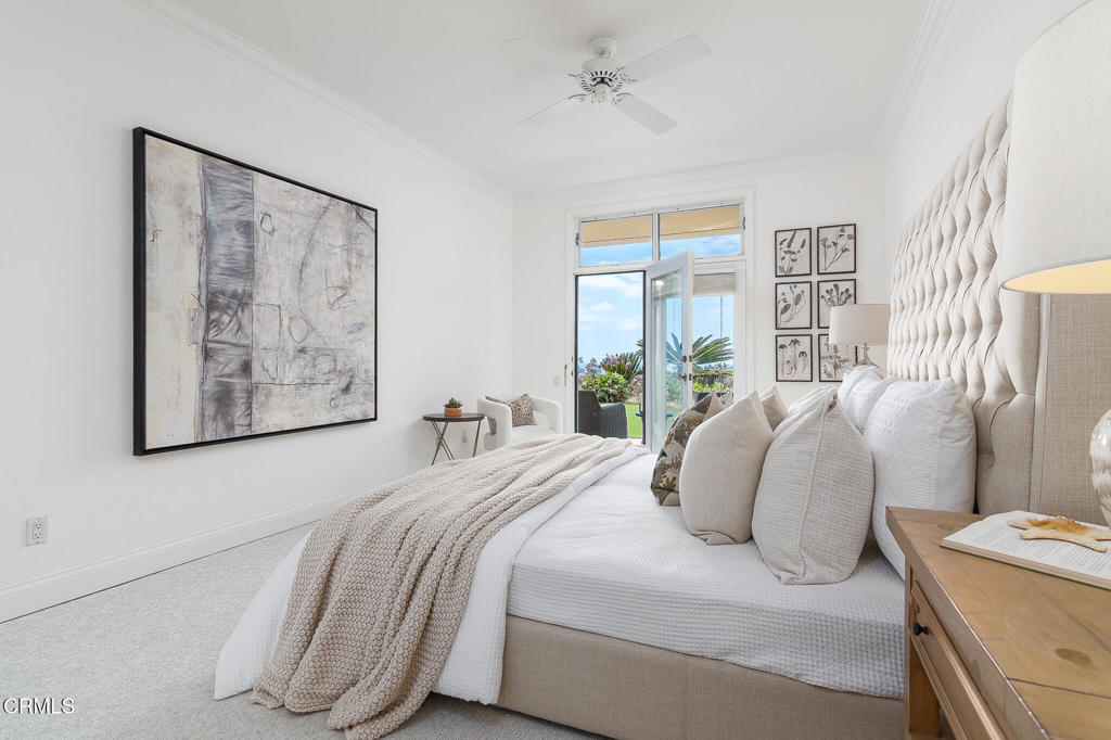 101 Rios Court Solana Beach, CA 92075 - Photo 25 of 67 a bedroom with a bed and a painting on the wall