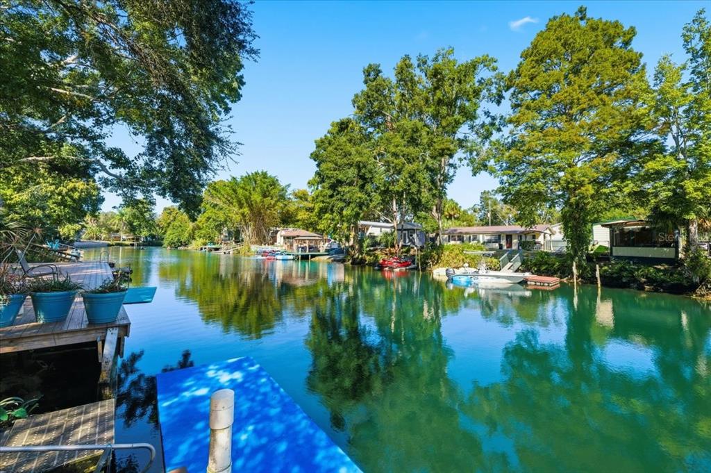 6715 West Richard Drive Weeki Wachee, FL 34607 - Photo 34 of 47 a view of a lake with houses