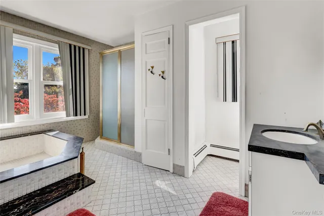 a view of workspace with furniture and window