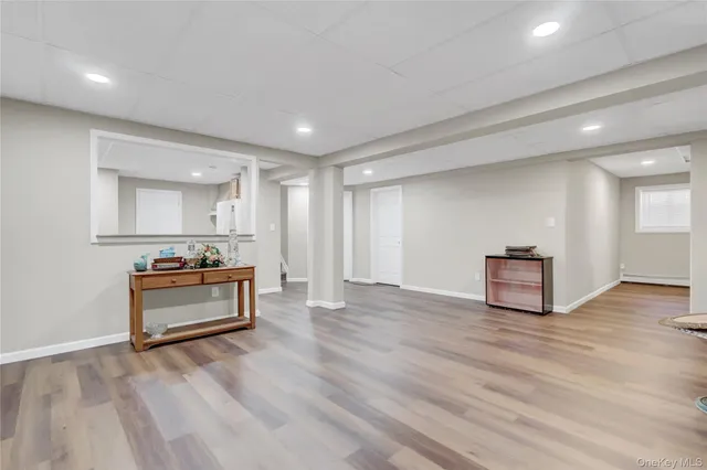 a utility room with sink dryer and washer