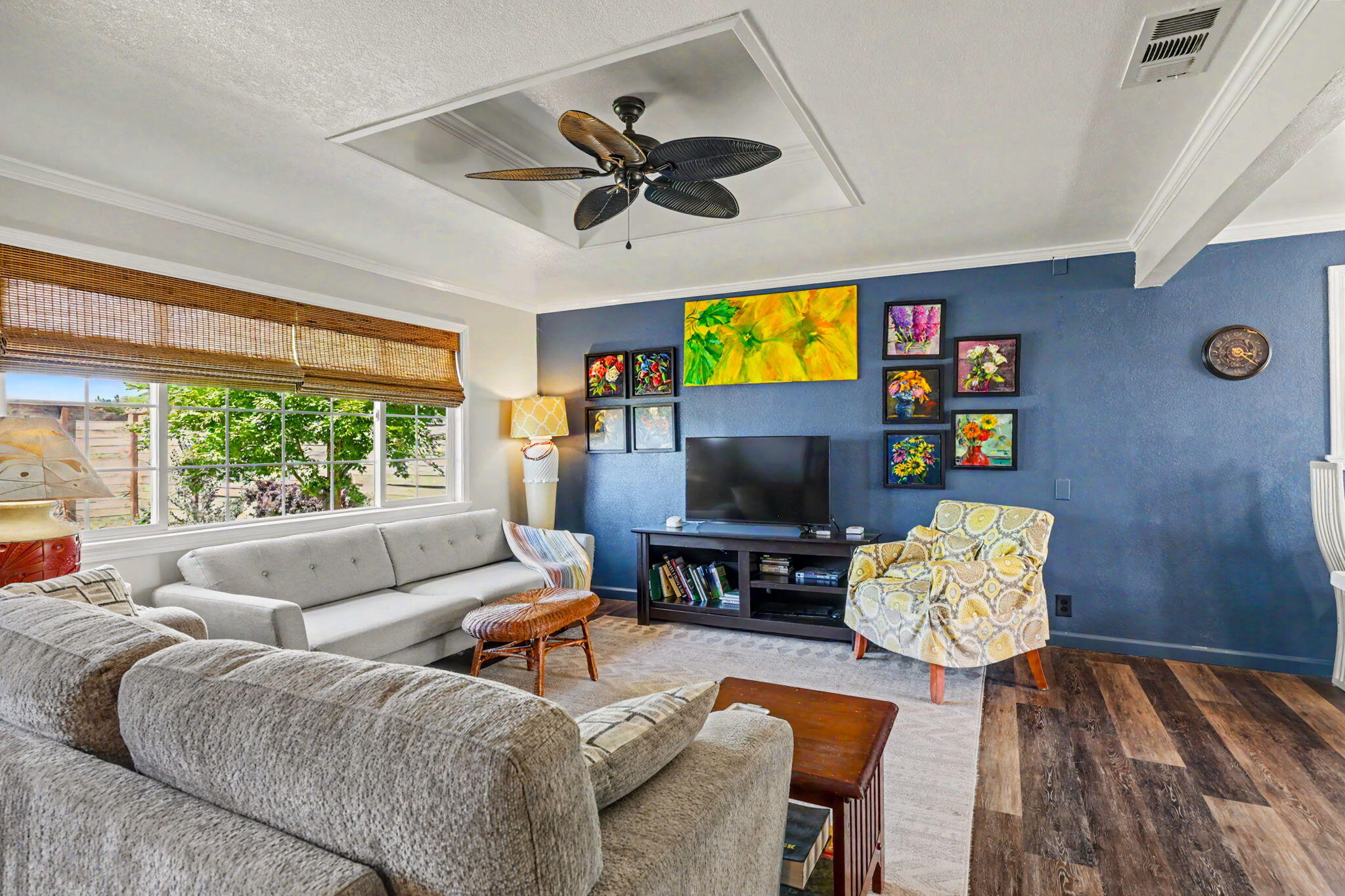 145 Highway 234 Eagle Point, OR 97524 - Photo 6 of 43 a living room with furniture and a flat screen tv