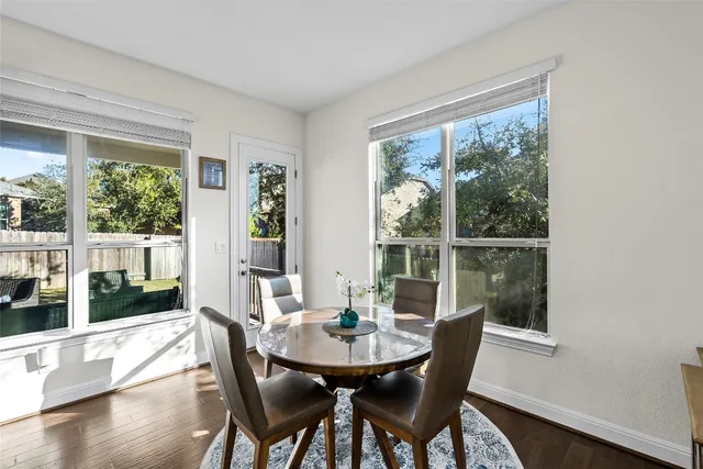 a view of a living room and dining room