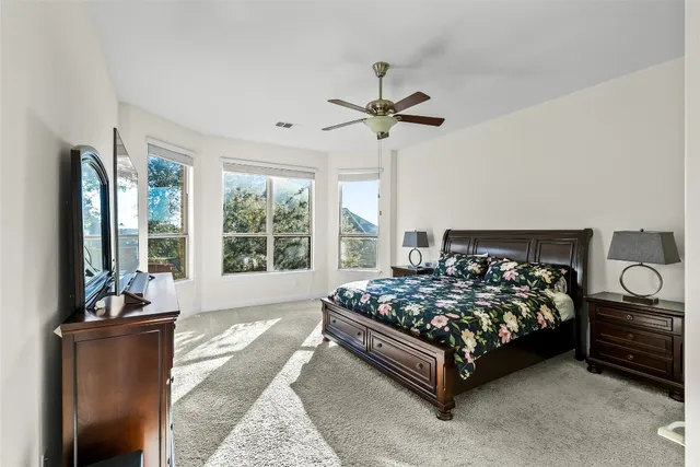 a dining room with furniture window and wooden floor