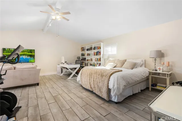 a bed room with a bed and a couch