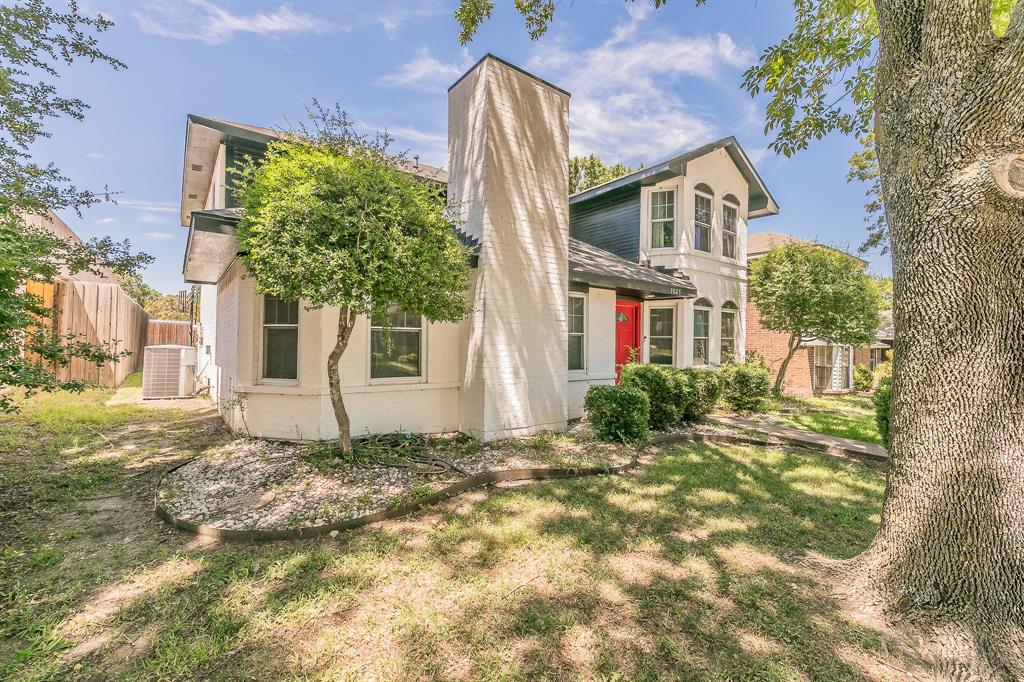 3025 David Drive Rowlett, TX 75088 - Photo 2 of 23 Rear view of property with a chimney