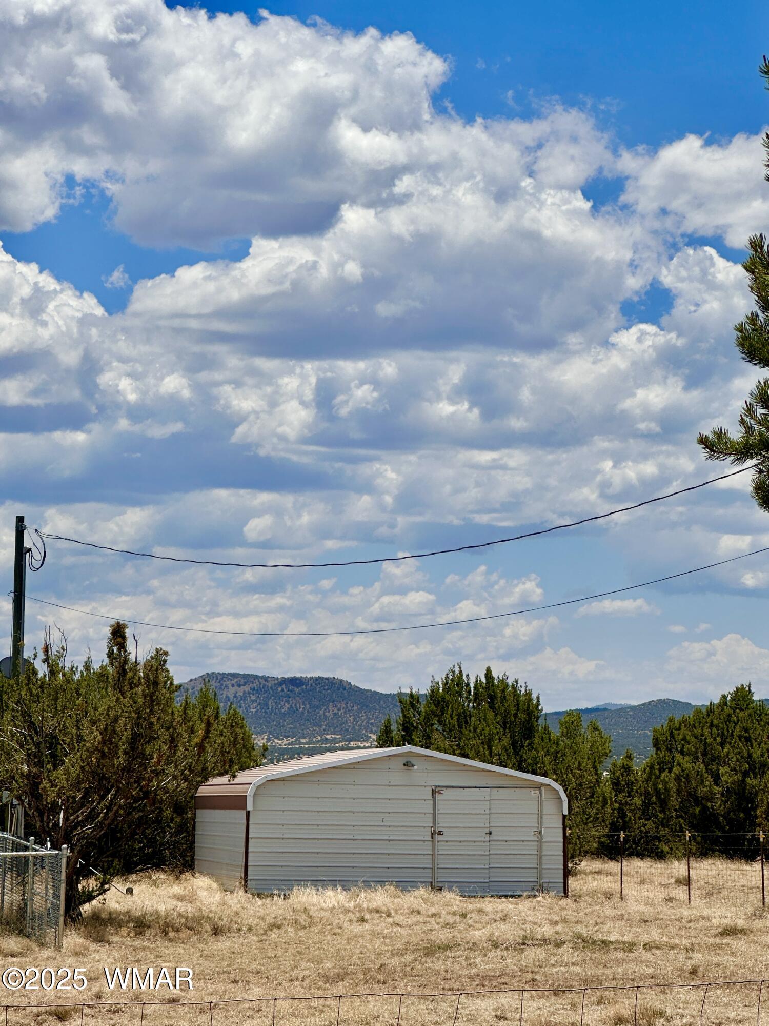 52 County Road Concho, AZ 85924 - Photo 27 of 33 2 CAR WORKSHOP/ POSS GARAGE