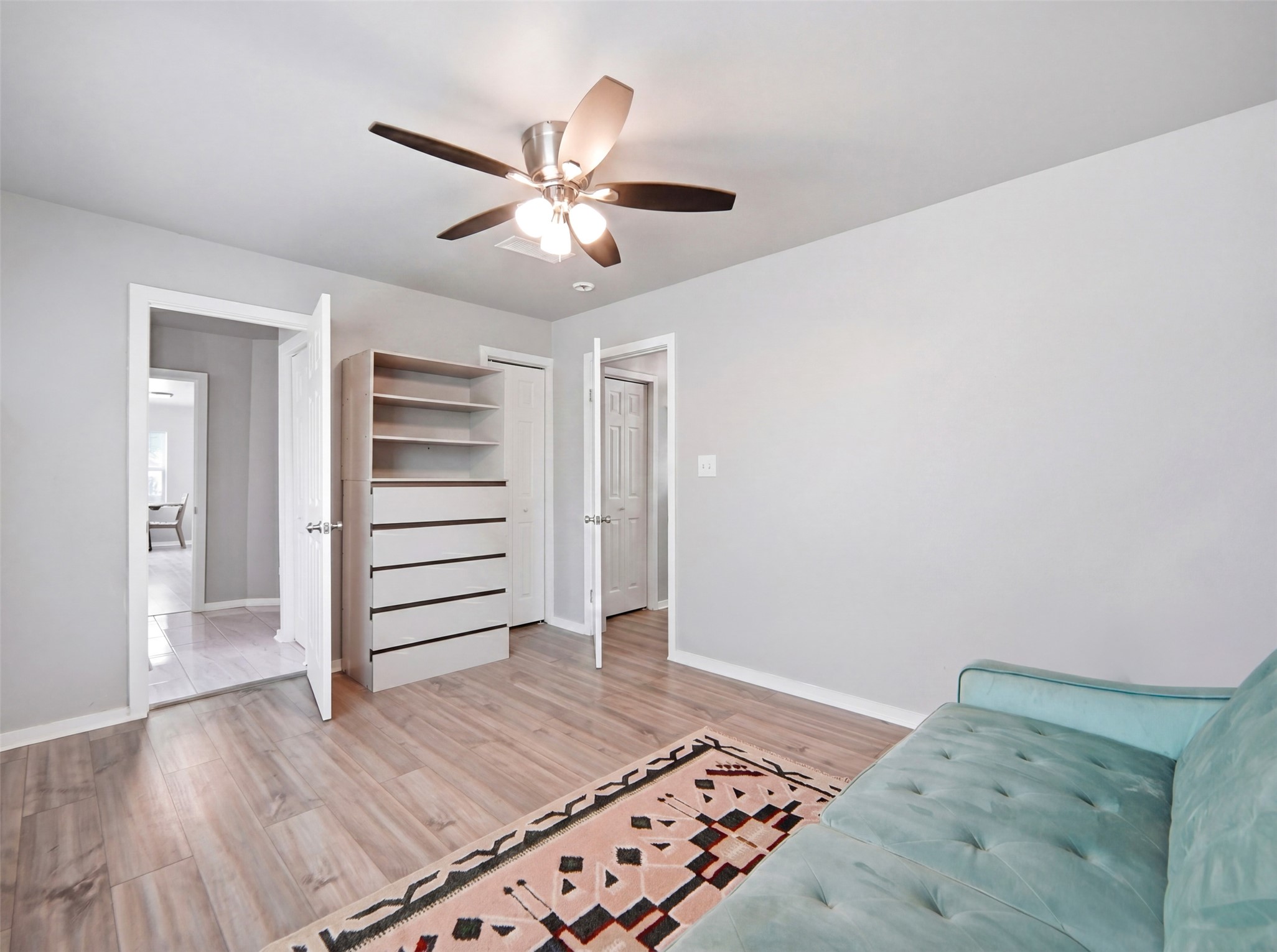 700 9th Street Blanco, TX 78606 - Photo 21 of 33 a view of a bedroom with wooden floor