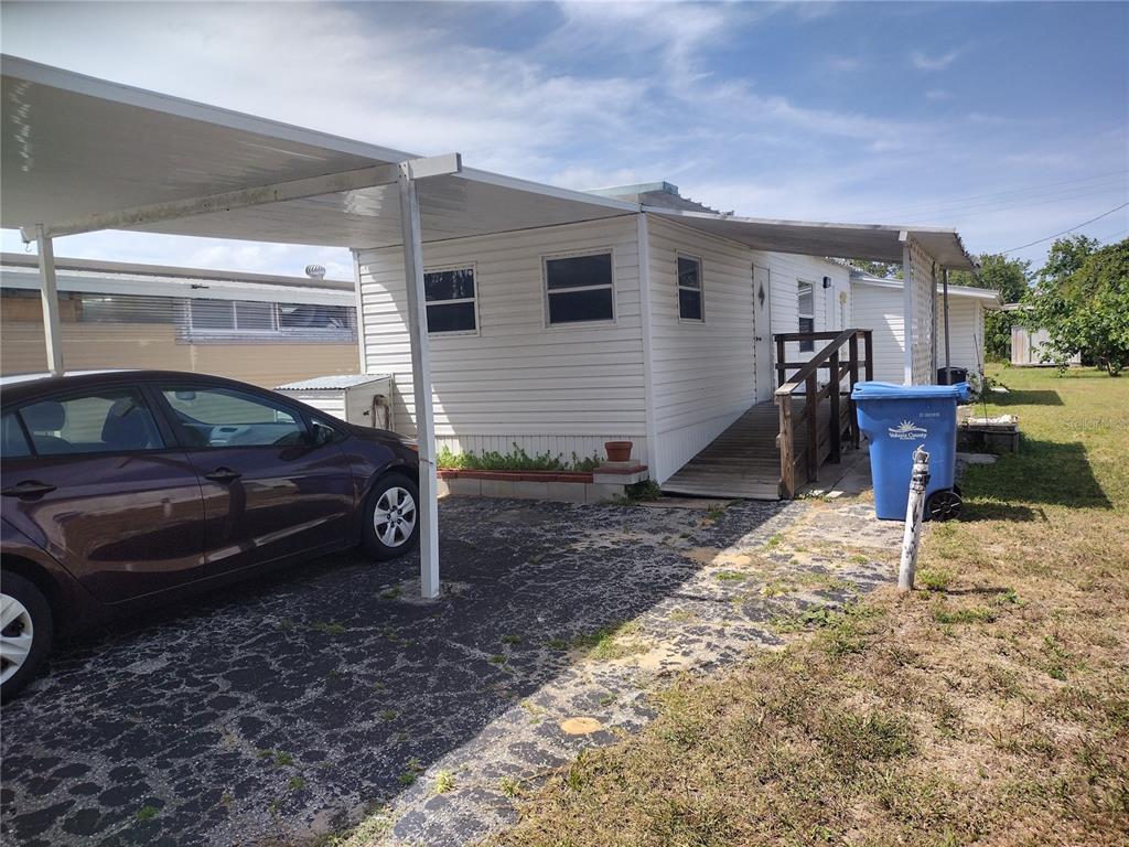 a house view with a backyard space
