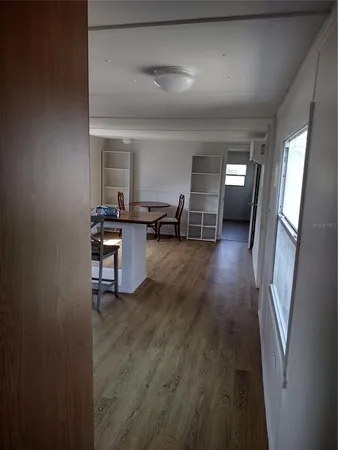 wooden floor and dining room with furniture and wooden floor