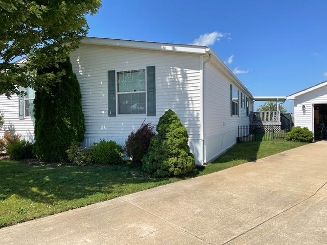 663 Laurel Manteno, IL 60950 - Photo 1 of 1 a front view of a house with garden