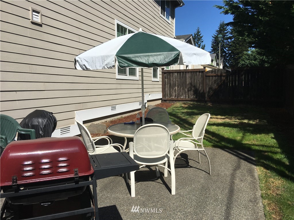 6793 Southeast 2nd Street Renton, WA 98059 - Photo 22 of 23 a view of a patio with couple of chairs