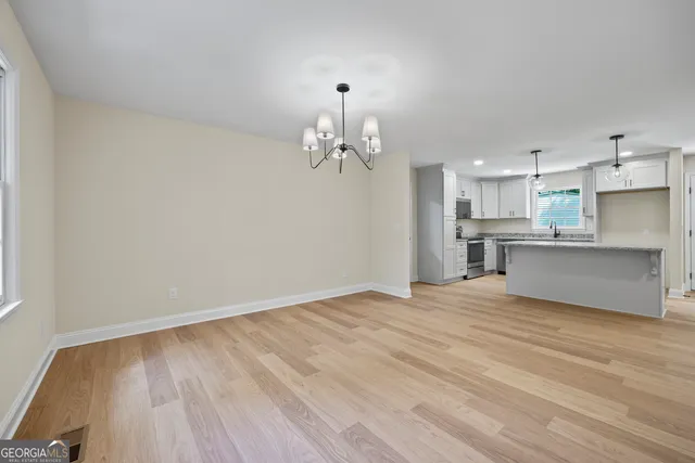 a view of a kitchen with marble kitchen and kitchen area