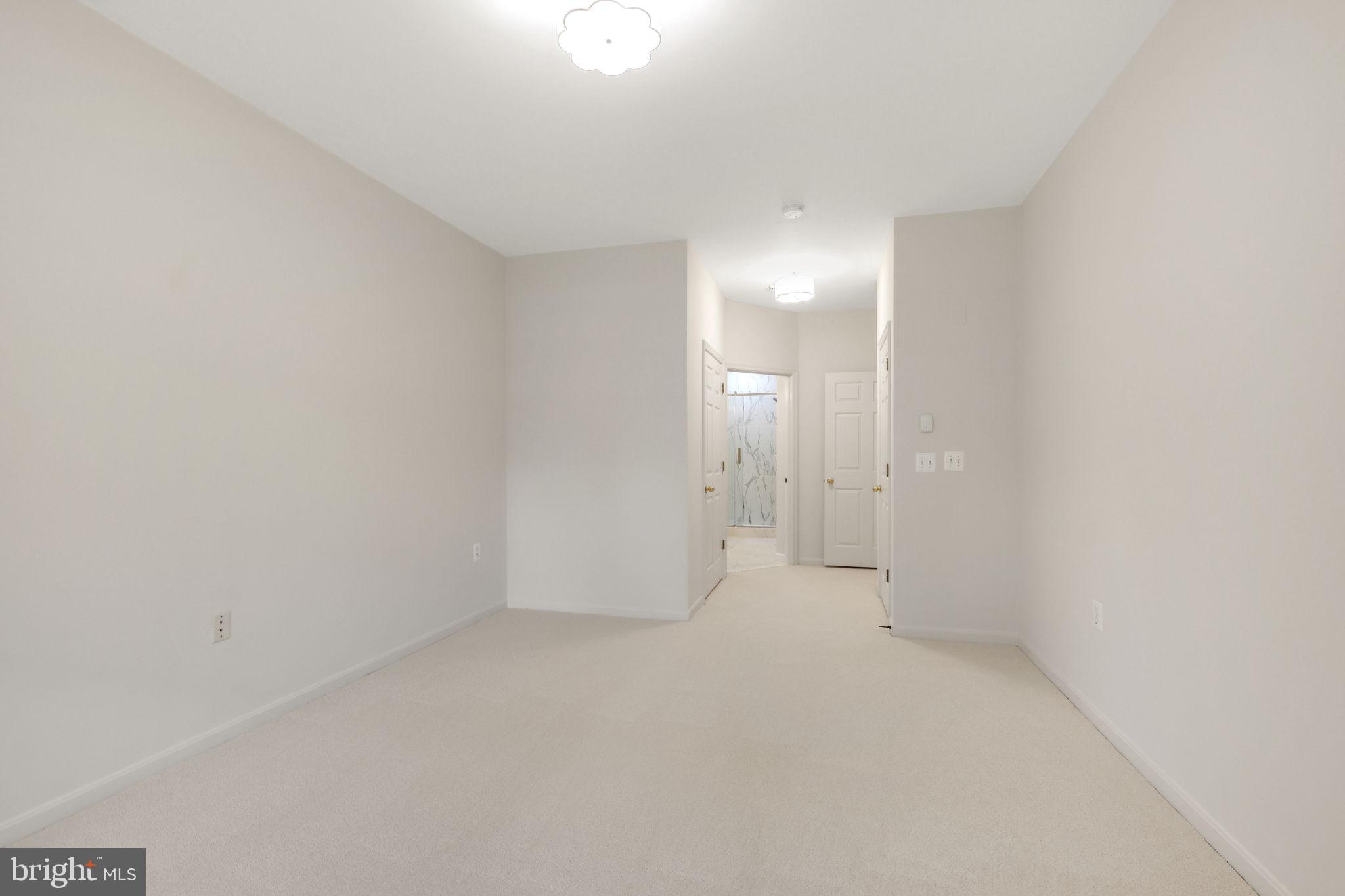 150 Chevy Chase Street, Unit 102 Gaithersburg, MD 20878 - Photo 14 of 41 a view of empty room