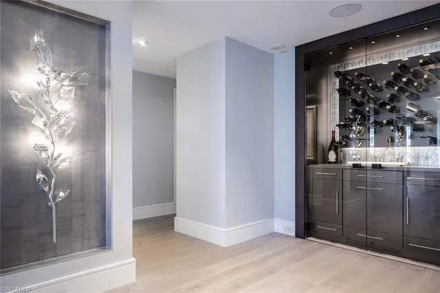 a view of a hallway with a flat screen tv