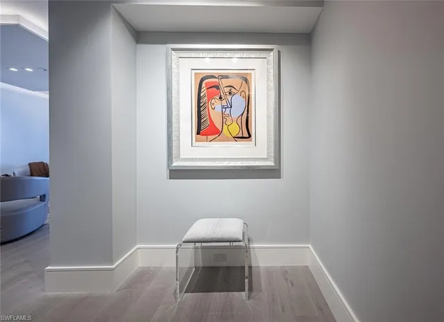 a spacious bedroom with a bed and a couch