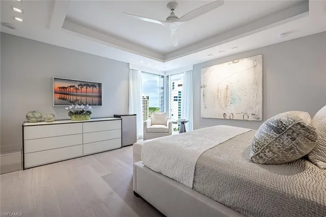 a bathroom with a sink a large mirror and shower