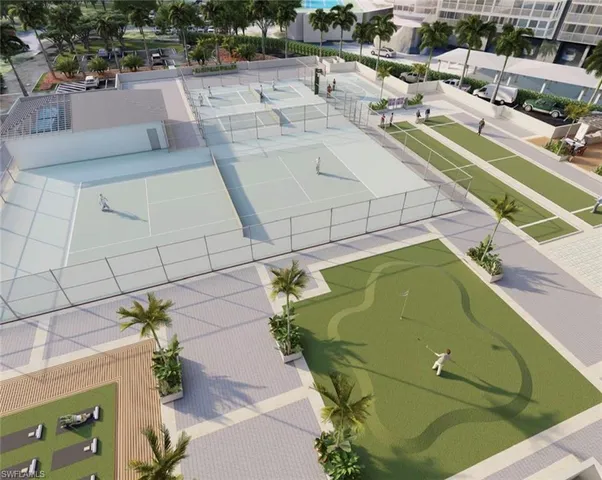 a view of swimming pool with outdoor seating and buildings in the background