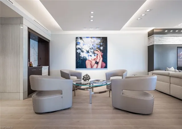 a living room with furniture and a table