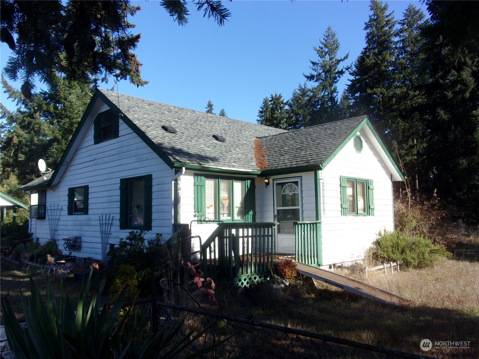 3109 Military Road East Tacoma, WA 98446 - Photo 3 of 20 a front view of house with yard and green space