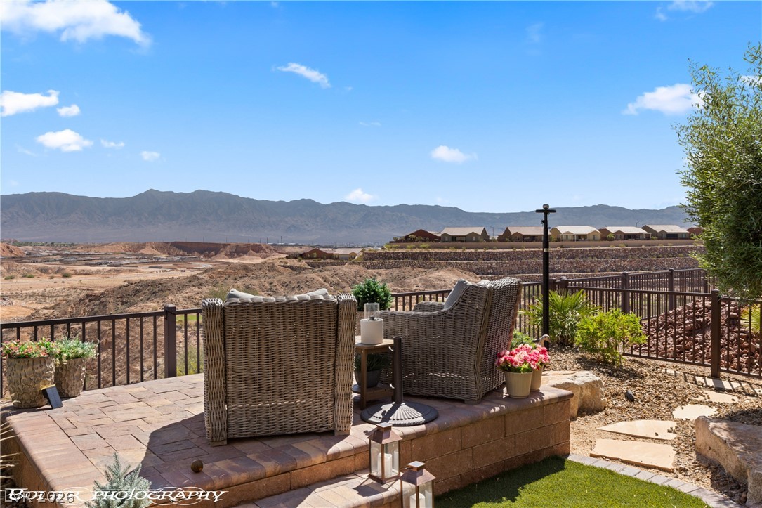 1262 Serenity Ridge Court Mesquite, NV 89034 - Photo 12 of 74 View of patio with a mountain view