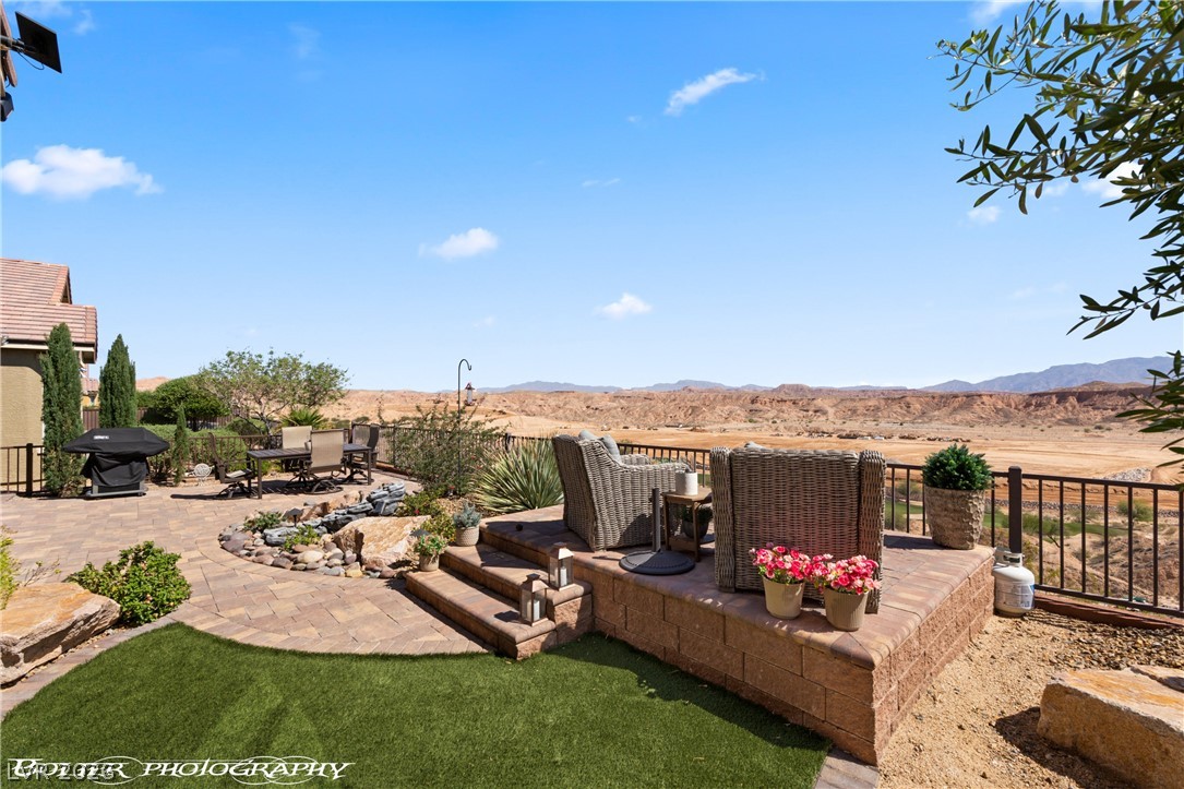 1262 Serenity Ridge Court Mesquite, NV 89034 - Photo 18 of 74 View of patio featuring grilling area and a mountain view