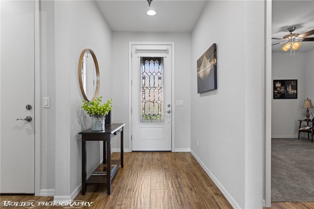 1262 Serenity Ridge Court Mesquite, NV 89034 - Photo 30 of 74 Entrance foyer featuring a ceiling fan and wood finished floors