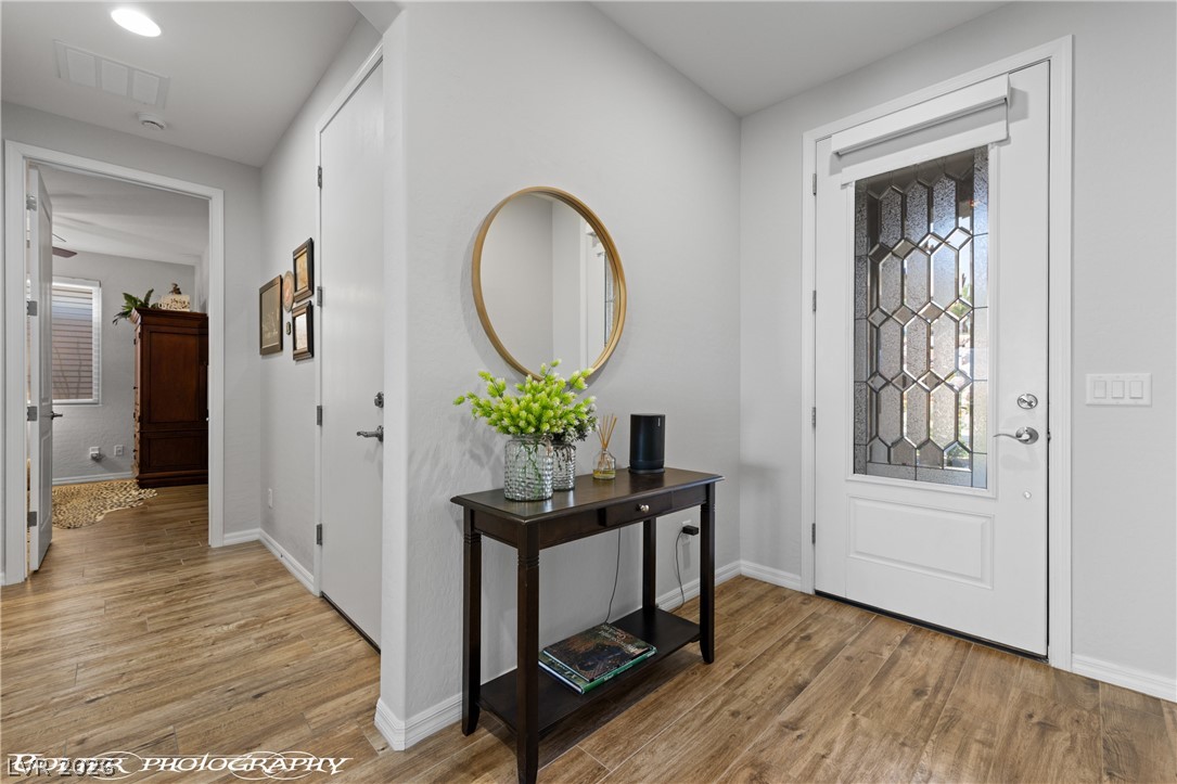 1262 Serenity Ridge Court Mesquite, NV 89034 - Photo 32 of 74 Foyer with light wood finished floors and plenty of natural light