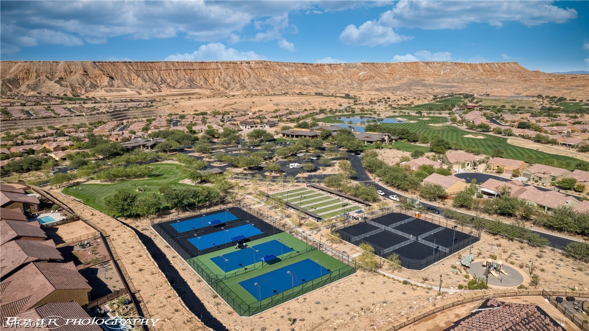 1262 Serenity Ridge Court Mesquite, NV 89034 - Photo 71 of 74 Aerial perspective of suburban area with pickleball courts and Conestoga golf course