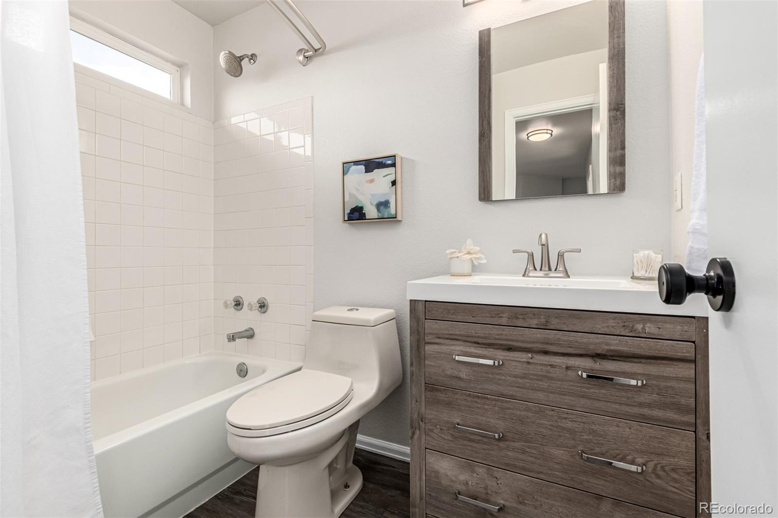 3705 Bucknell Circle Highlands Ranch, CO 80129 - Photo 25 of 42 a bathroom with a sink a toilet and shower
