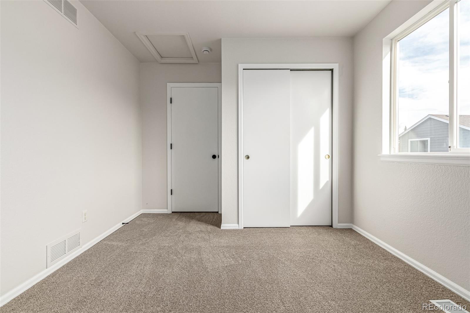3705 Bucknell Circle Highlands Ranch, CO 80129 - Photo 29 of 42 a view of an empty room with a window
