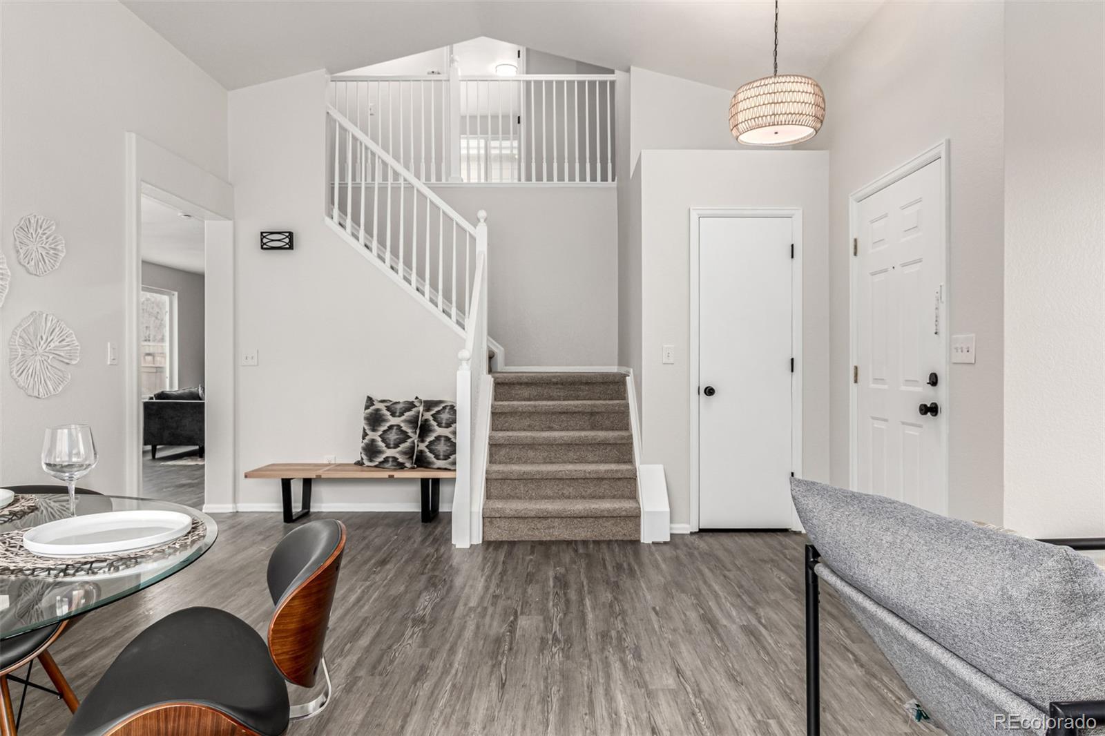 3705 Bucknell Circle Highlands Ranch, CO 80129 - Photo 8 of 42 a view of a livingroom with furniture and staircase