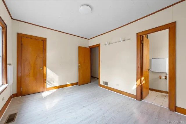 an empty room with closet