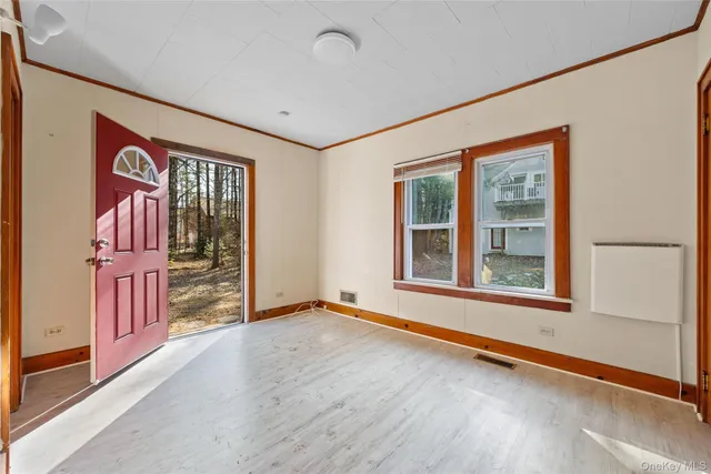 an empty room with windows